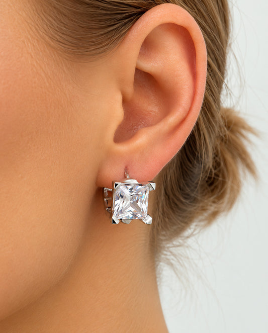 Muse-18k gold plated hoop earrings featuring sparkling princess-cut cubic zirconia.