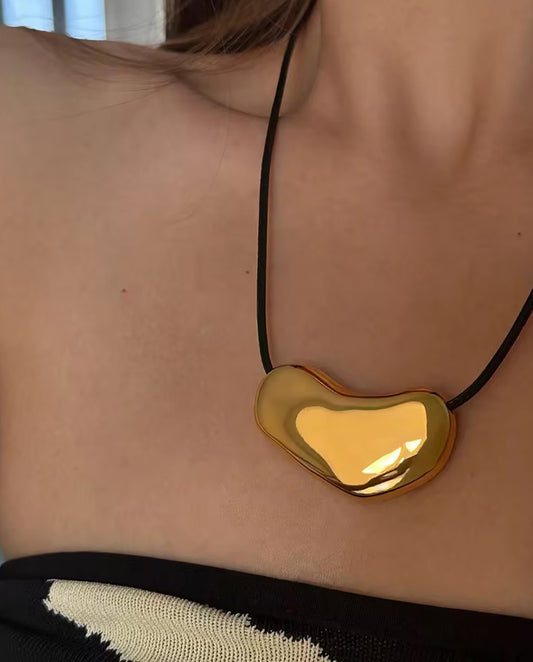 Isolde - cord necklace with big 18k gold plated pedant , gold color