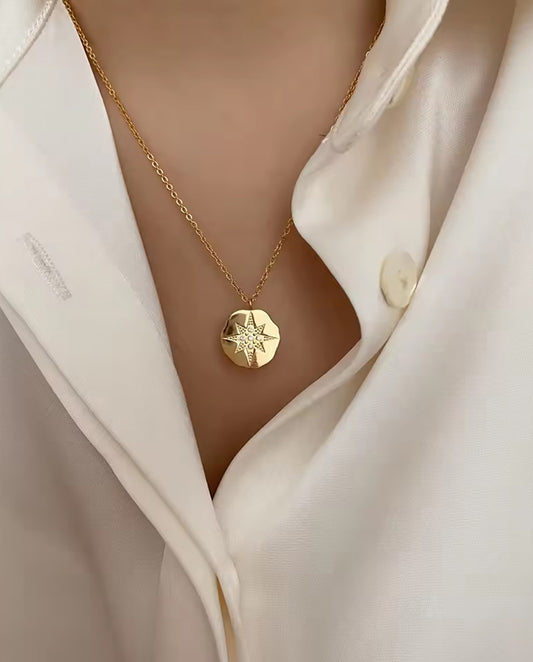 Marguerite - 18k gold plated chain necklace with gold disk as pedant with a star inside gold color