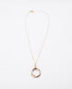Valentina - refined and elegant 18k gold plated necklace with interlocking rings pedant in tri-tone metal gold color