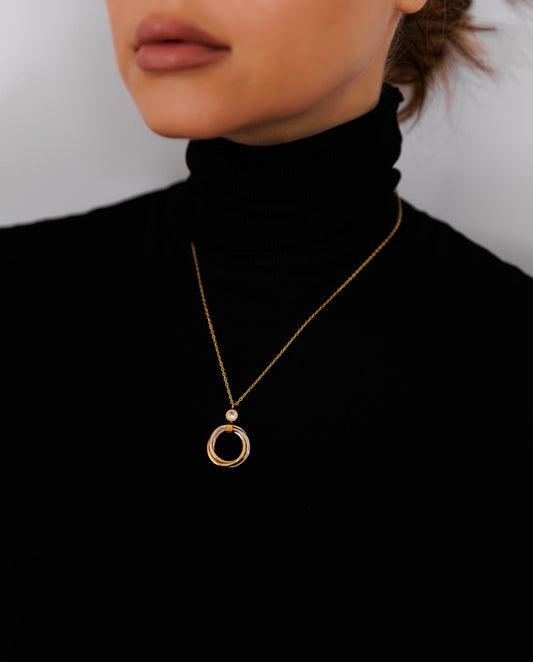 Valentina - refined and elegant 18k gold plated necklace with interlocking rings pedant in tri-tone metal gold color