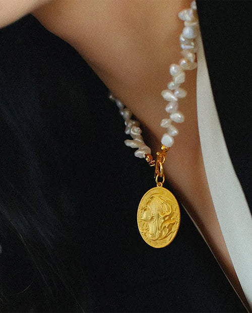Evania - real pearls necklace with 18k gold plated oval medallion pendant