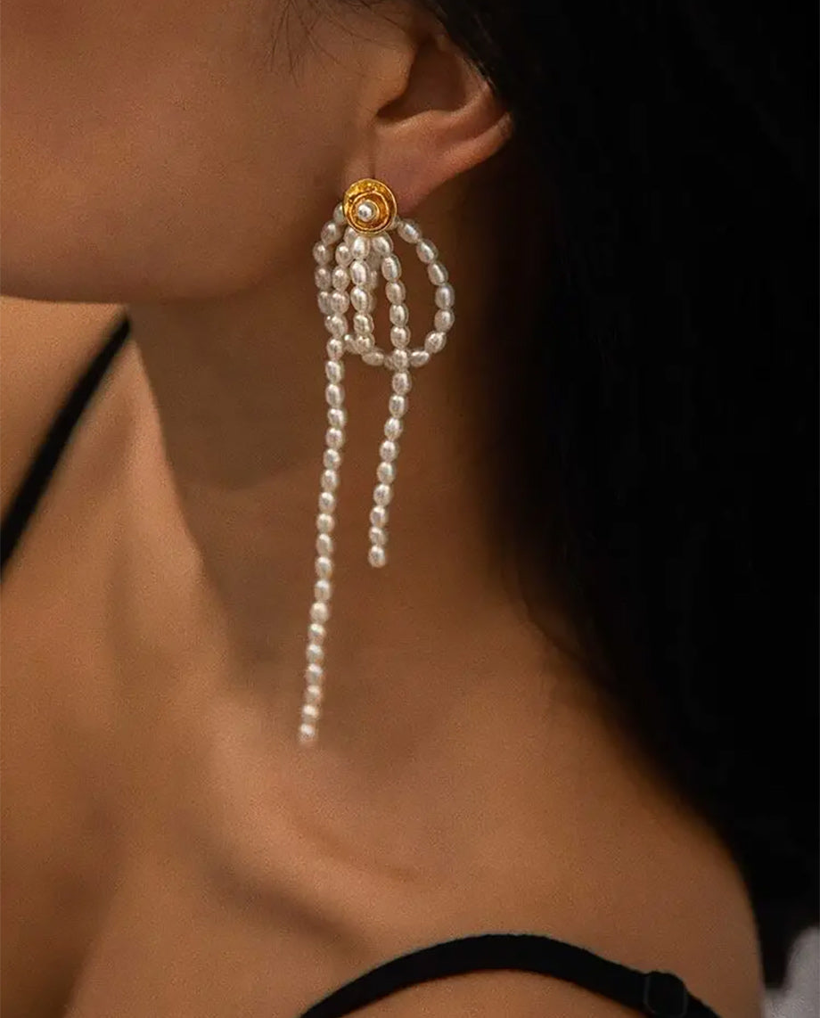 Celeste - 18k gold plated natural pearls studs , bow shape