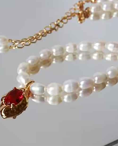 Zinnia - real pearls necklace with 18k gold plated finishing with red stone pedant