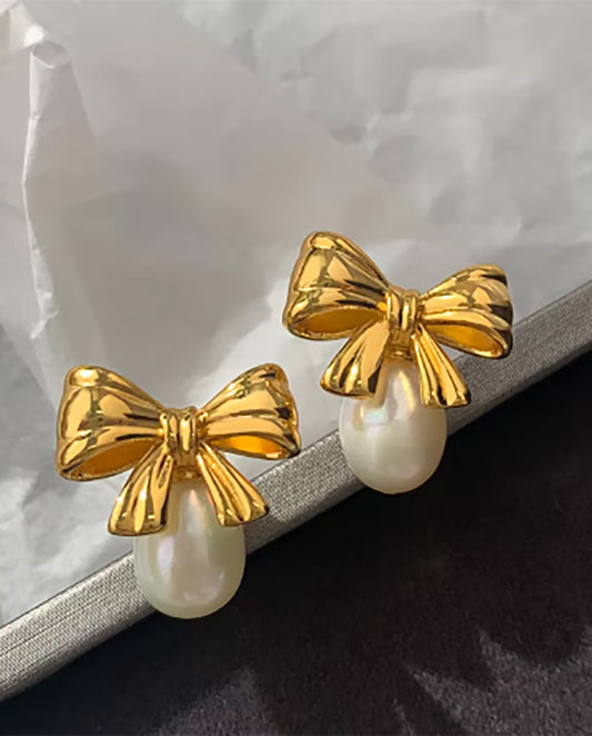 Mia - 18k gold plated gold-tone bows with dangling pearl accents earrings