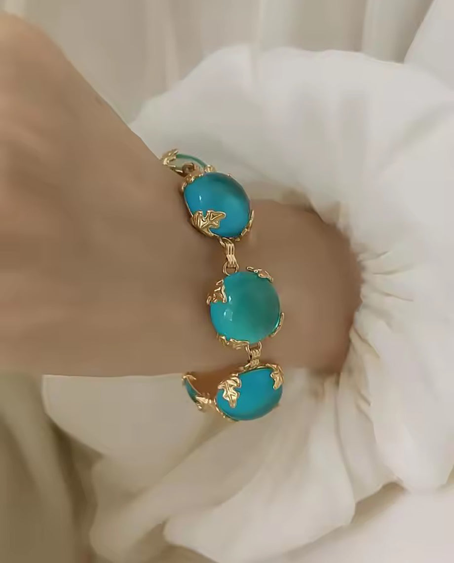 Astrid -  vibrant turquoise stones bracelet with 18k gold plated finishing