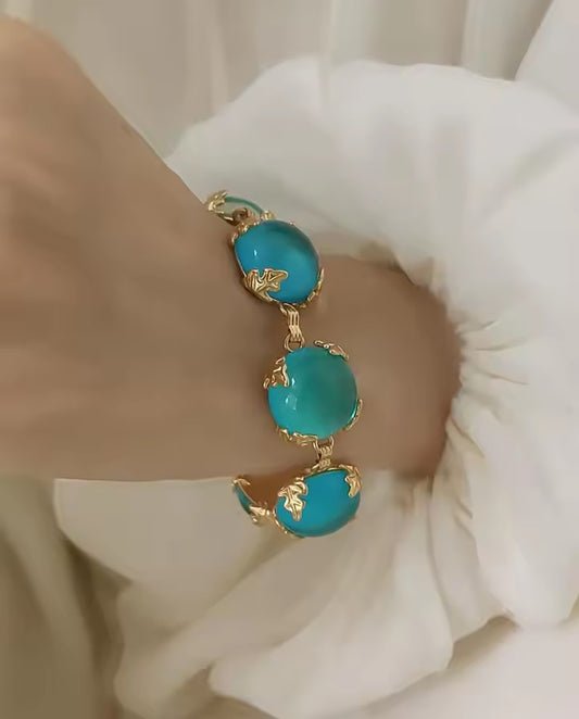 Astrid -  vibrant turquoise stones bracelet with 18k gold plated finishing