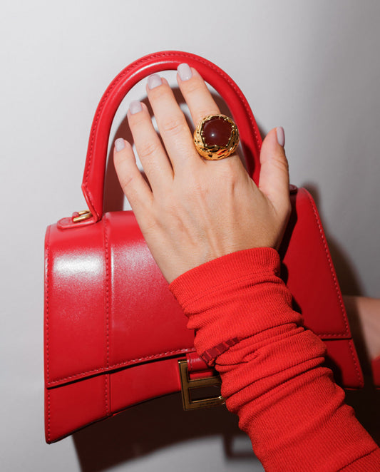 Augusta -  bold and artistic 18k gold plated  ring with big red stone , gold color