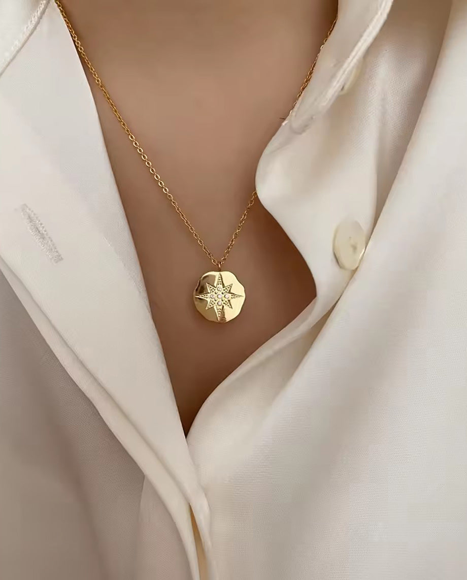 Marguerite - 18k gold plated chain necklace with gold disk as pedant with a star inside gold color