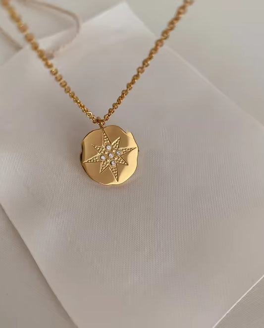 Marguerite - 18k gold plated chain necklace with gold disk as pedant with a star inside gold color