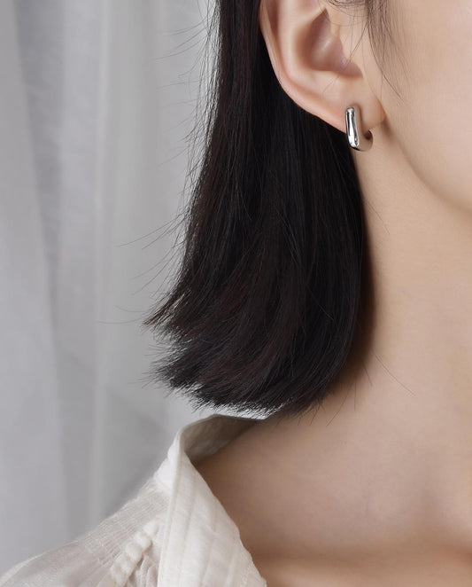 Maude - minimalistic design earrings , silver color