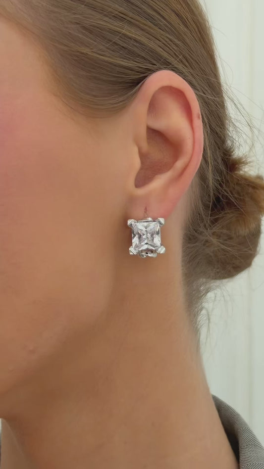Muse-18k gold plated hoop earrings featuring sparkling princess-cut cubic zirconia.